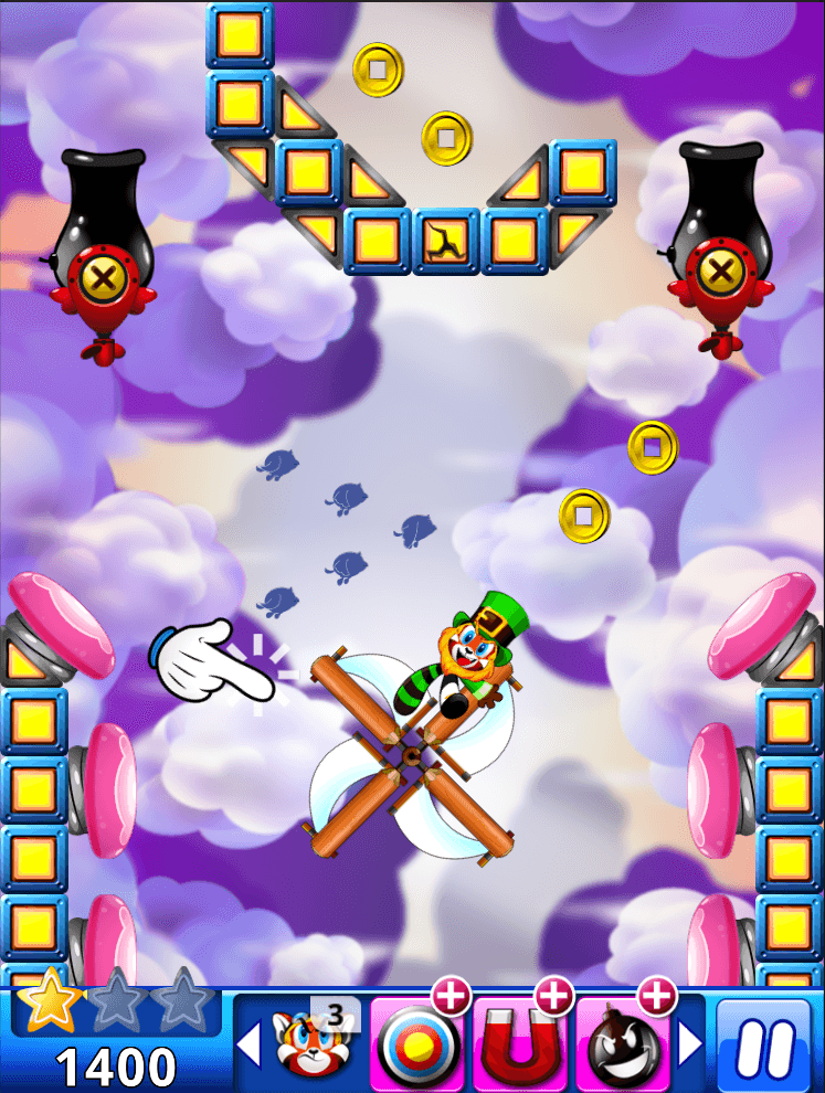 Kid Cannon in a green outfit riding a windmill between cloud-level cannons and bumpers